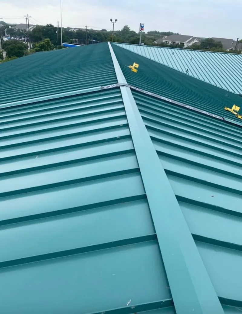 Green commercial metal roof ridge and valley for Metal Roof Repair in Glenvar Heights